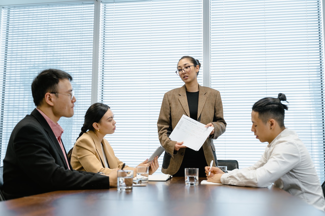 Photo of work team mates in a retrospective discussion