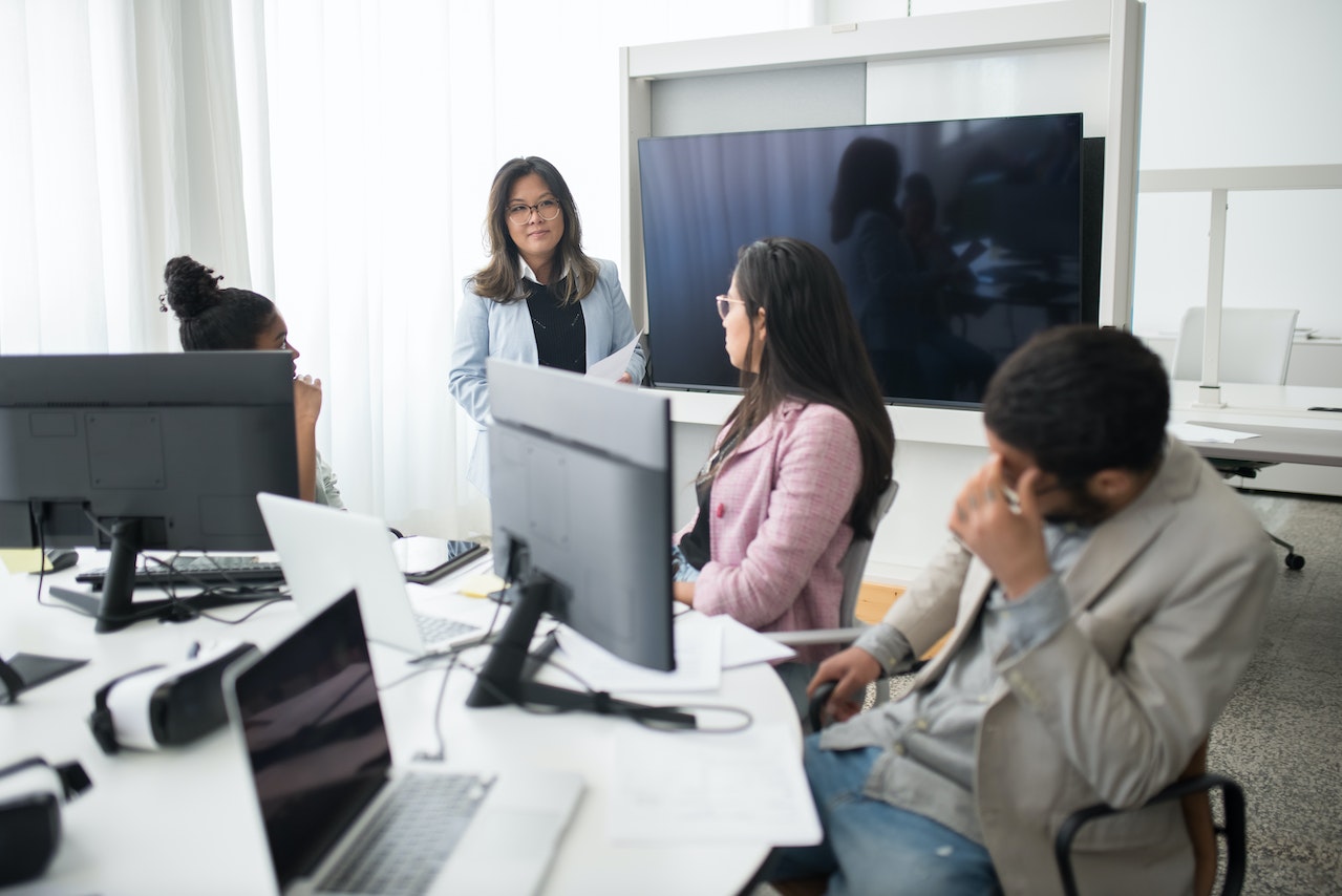 Photo of office people in a discussion