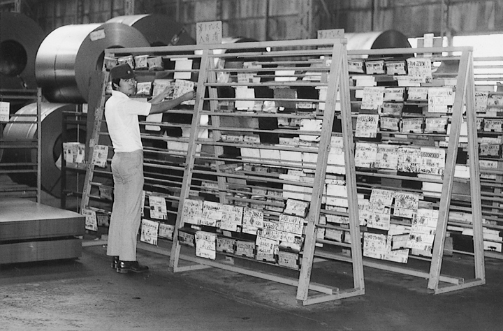 Black & White photograph of the early days process of Kanban developed first at Toyota